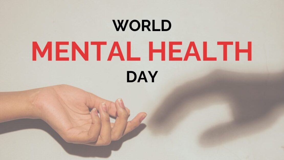 Two hands reaching out to symbolize support and connection, with the text 'World Mental Health Day.' An image dedicated to World Mental Health Day and workplace well-being.